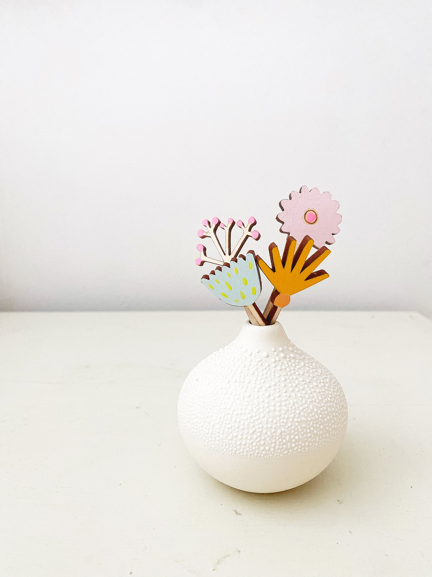 Hand-painted wooden wildflower stems