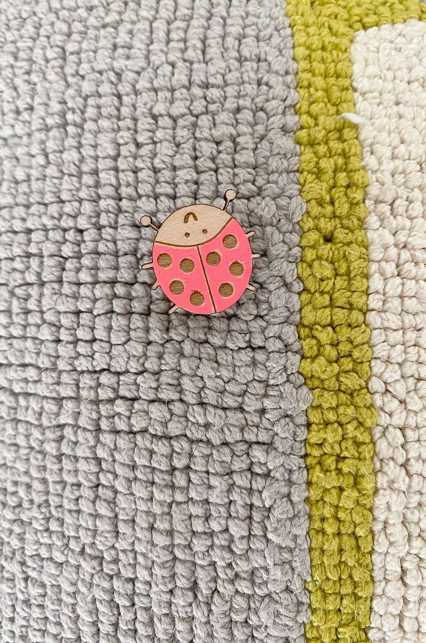 Hand-painted ladybird wooden pin badge